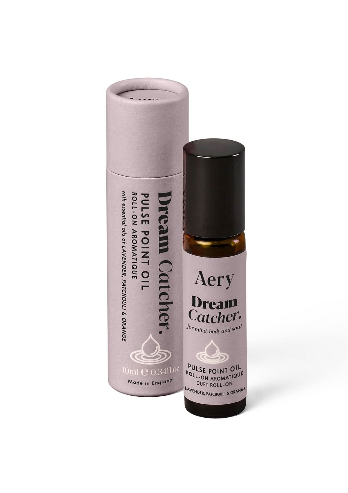 Lilac Dream Catcher Pulse Point Oil displayed next to product packaging by Aery on white background