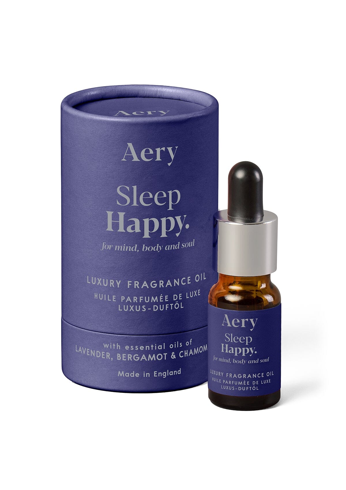 Blue Sleep Happy fragrance oil displayed next to product packaging by Aery on white background 