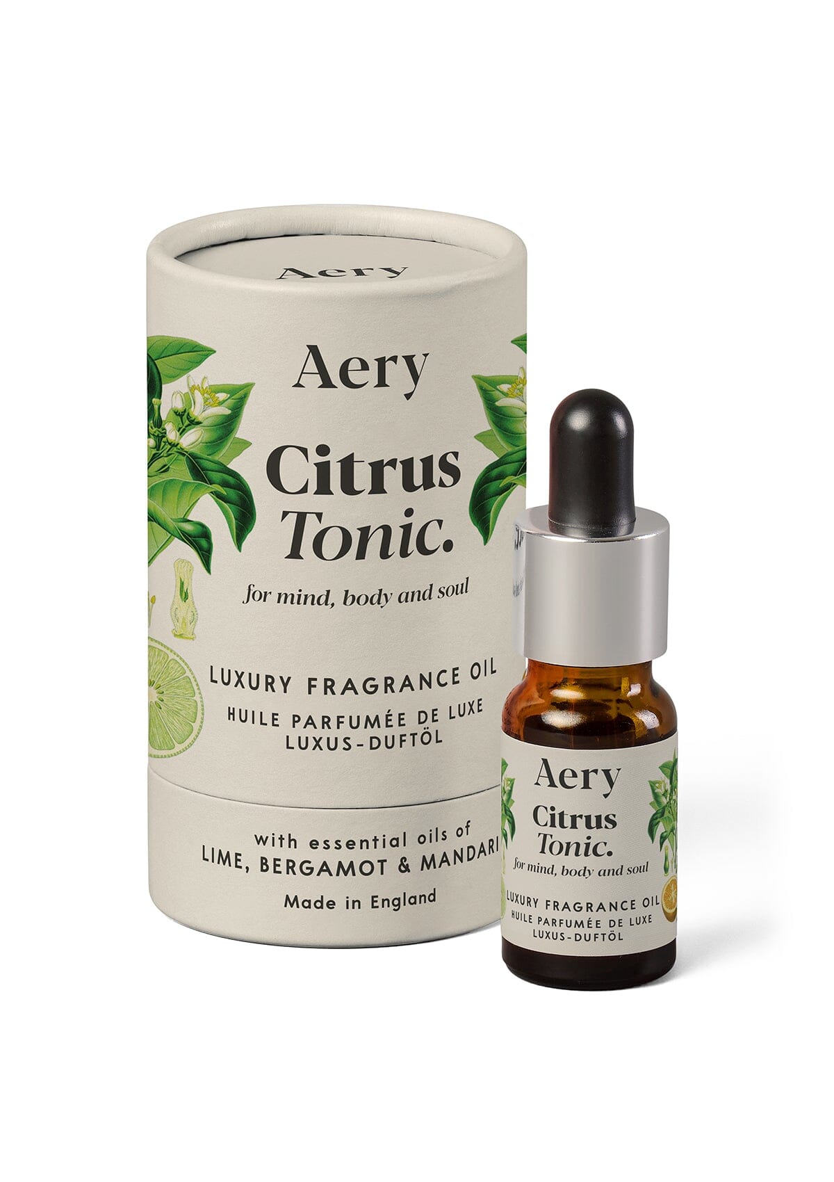 Cream Citrus Tonic fragrance oil displayed next to product packaging by Aery on white background 