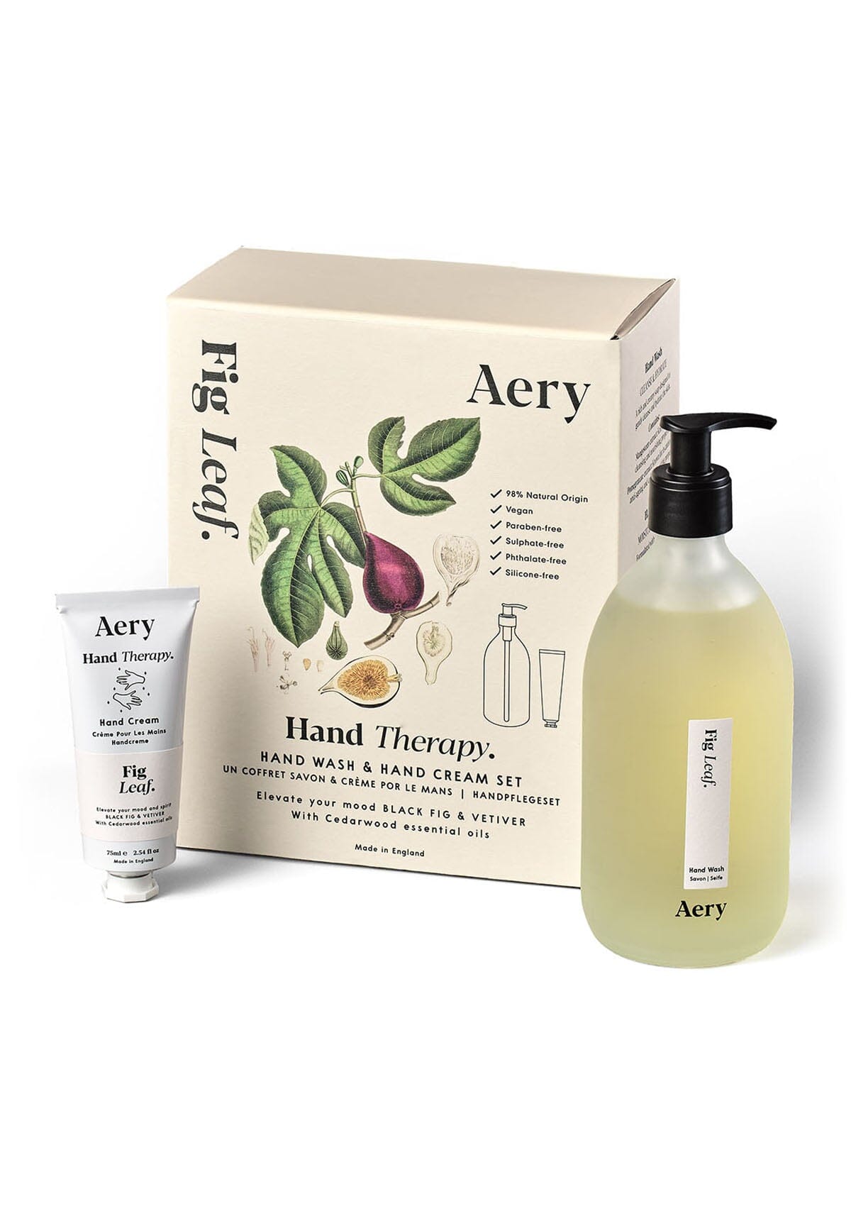Cream Fig Leaf hand cream and wash set displayed next to product packaging on white background 