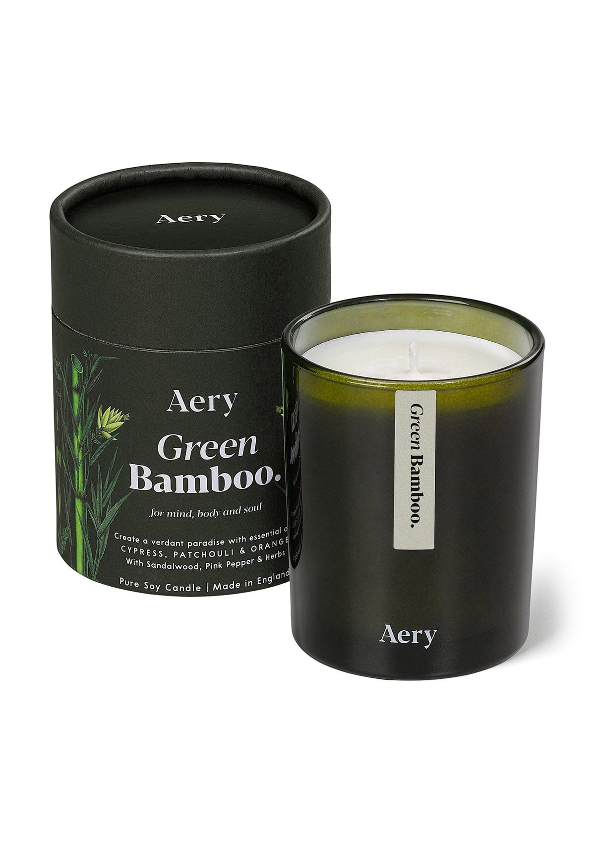 Green Bamboo candle by Aery displayed next to product packaging on white background