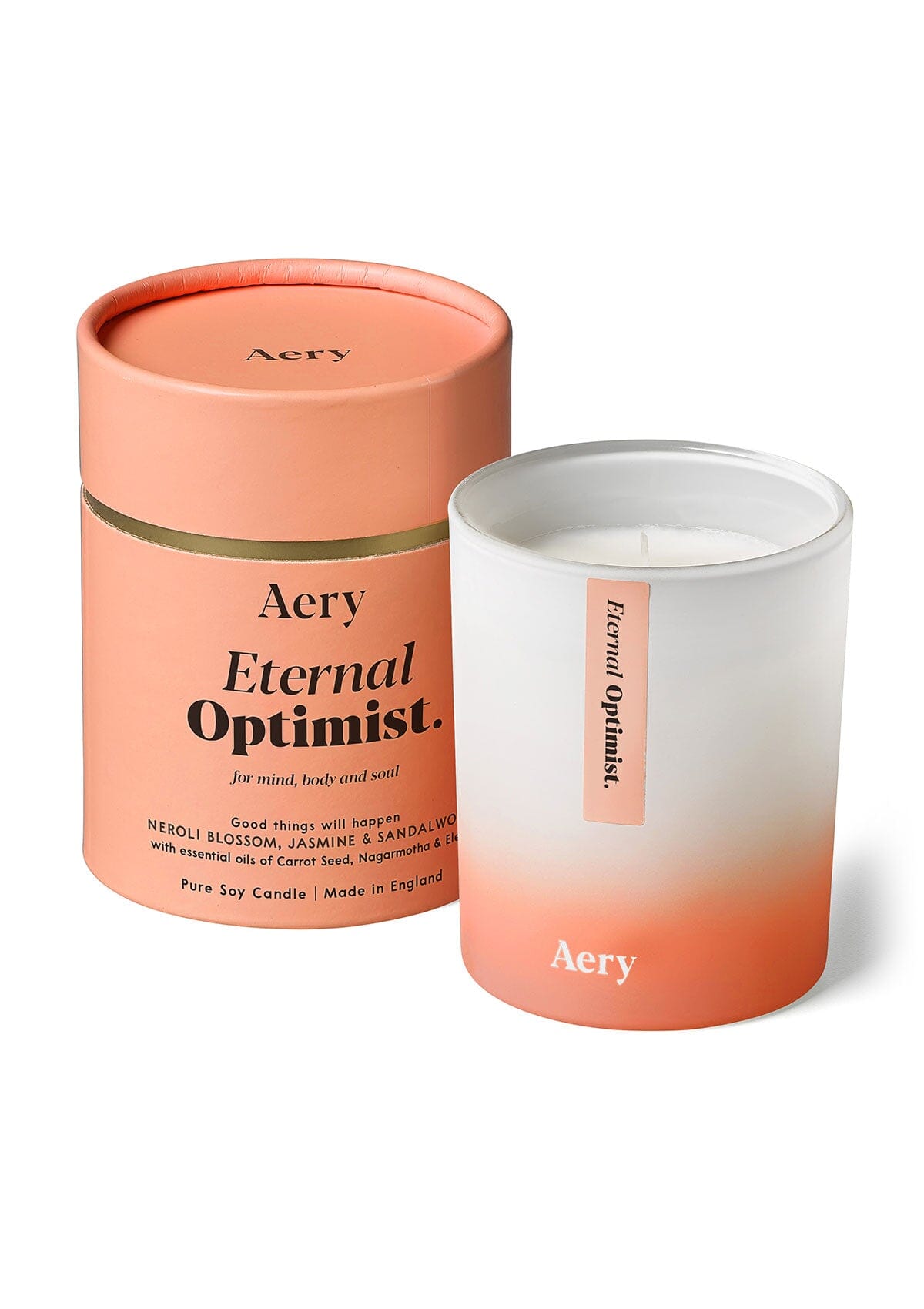 Orange Eternal Optimist candle by Aery displayed next to product packaging on white background 