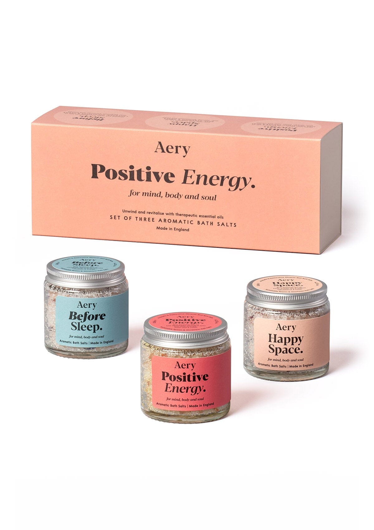 Orange Positive Energy Mini Baths Salts set of three by Aery displayed next to product packaging on white background