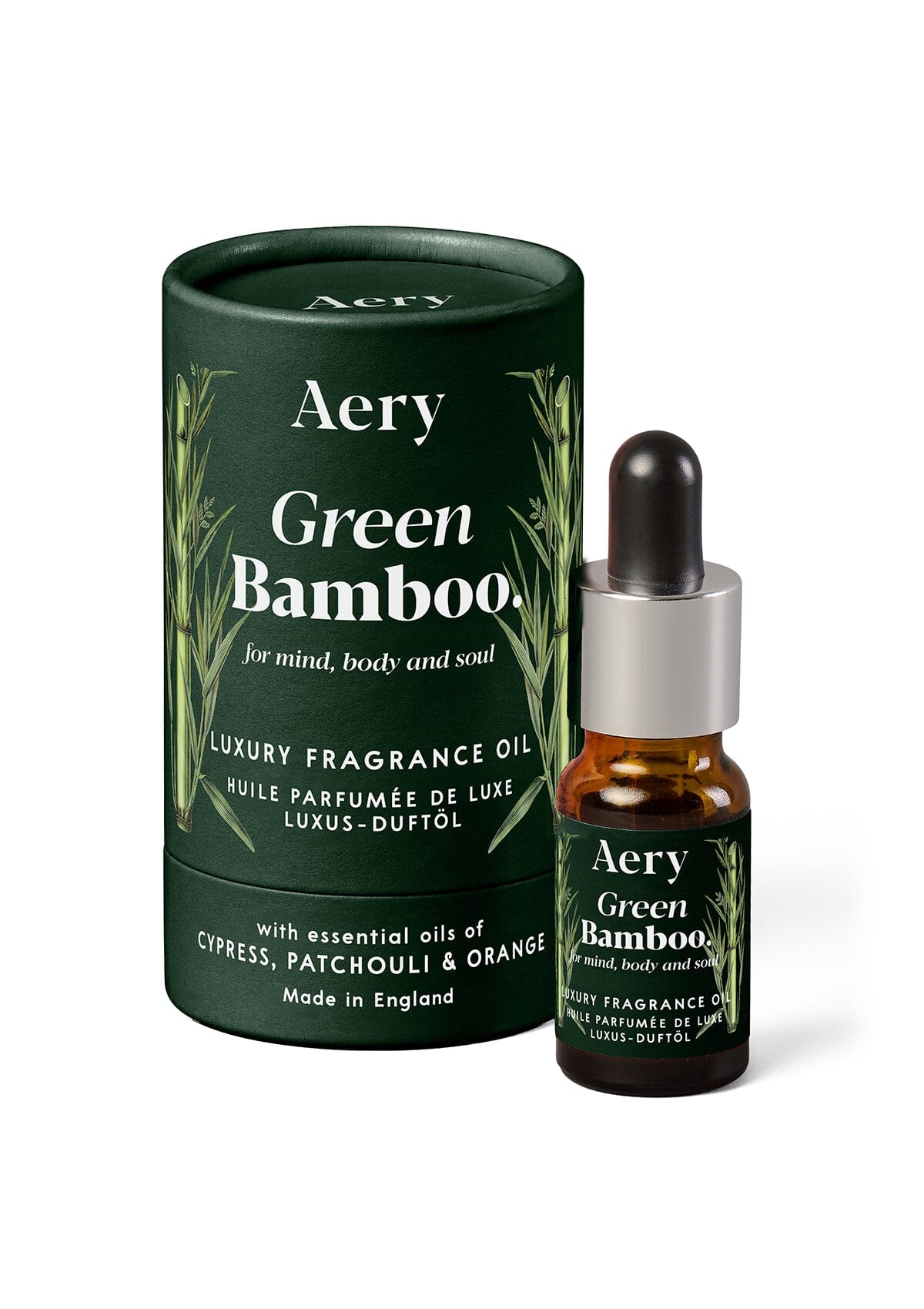 Green Bamboo fragrance oil displayed next to product packaging by Aery on white background 