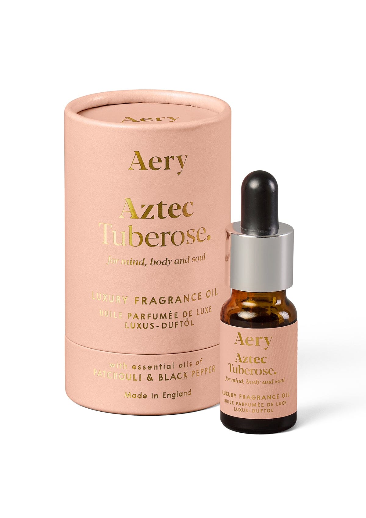 Peach Aztec Tuberose fragrance oil displayed next to product packaging by Aery on white background 