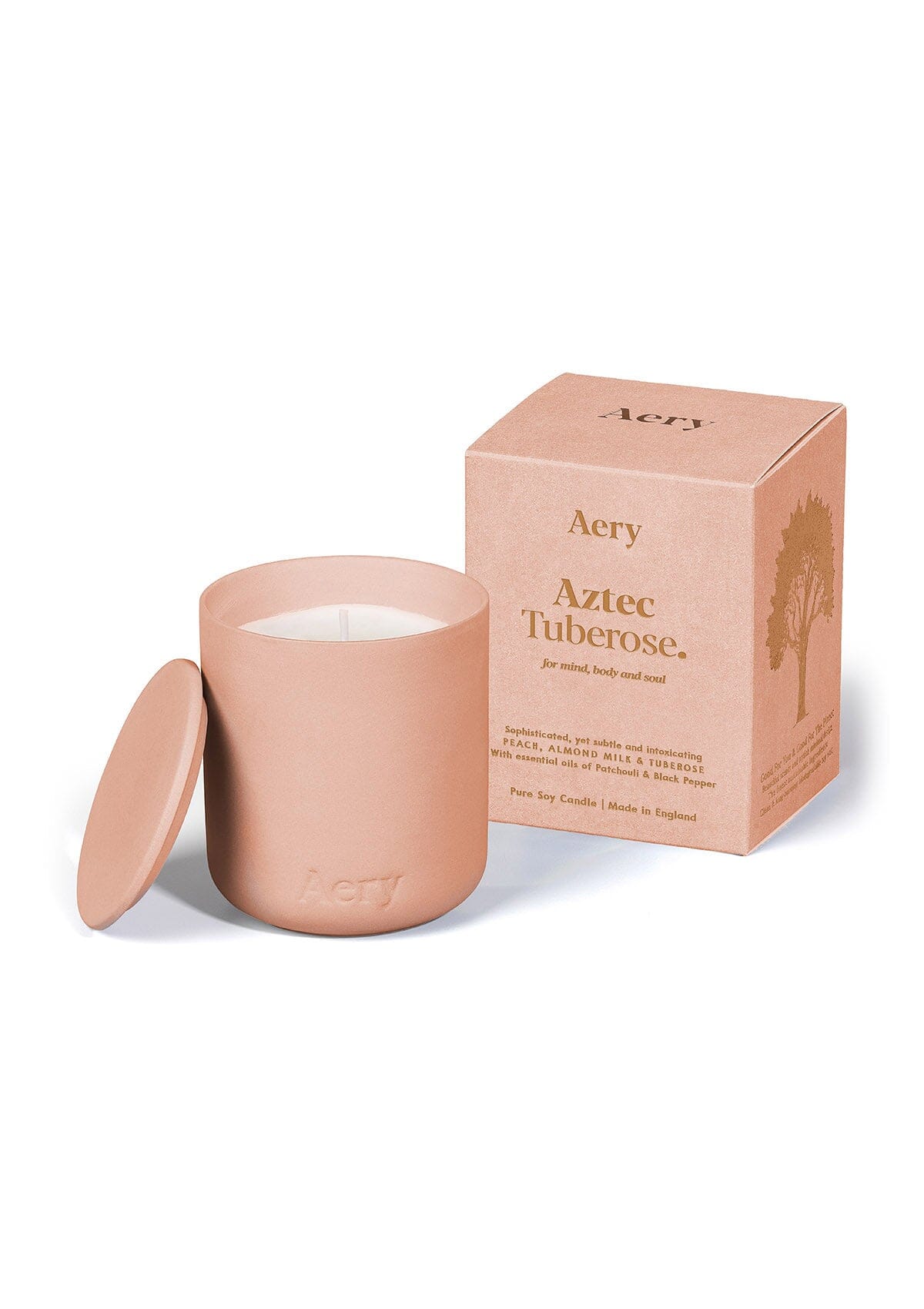 Peach Aztec Tuberose ceramic scented candle  by Aery on white background 