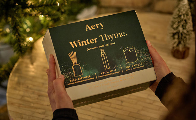person opening winter thyme gift set