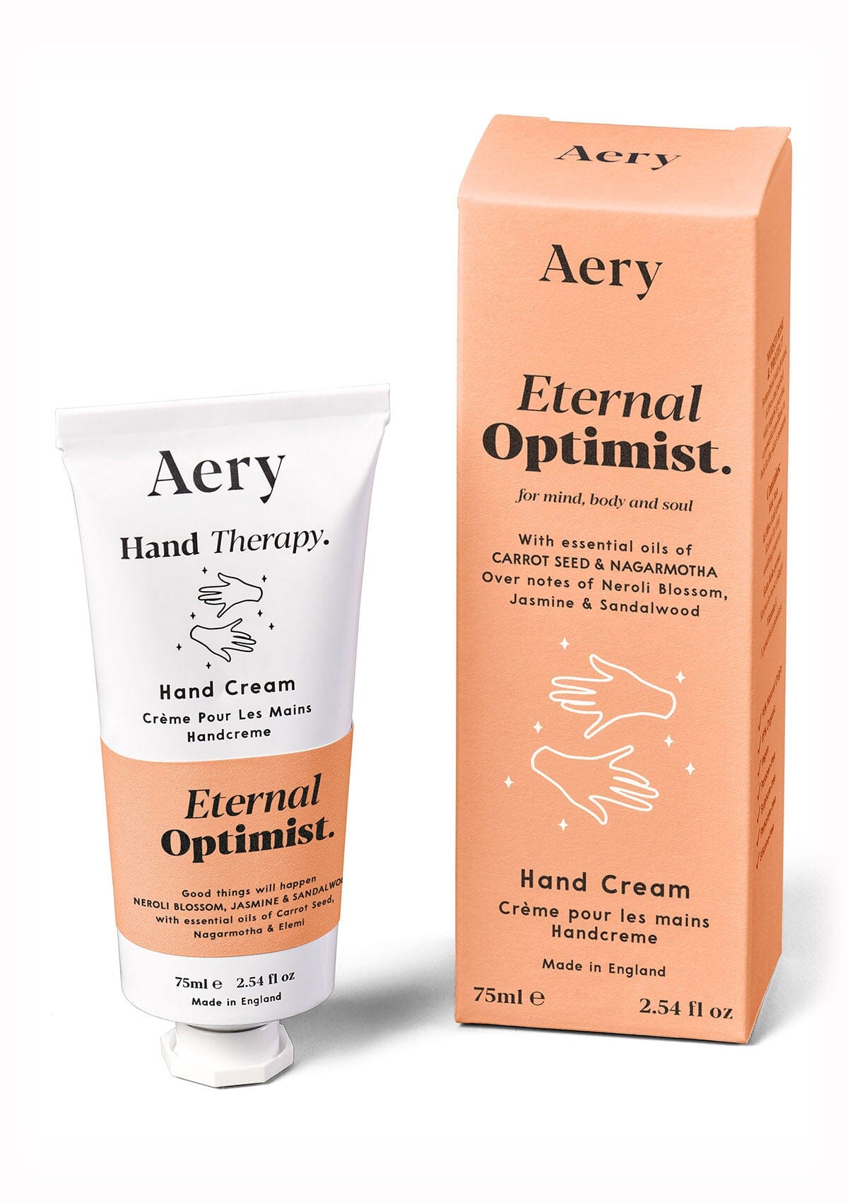 Orange Eternal Optimist hand cream displayed next to product packaging by Aery on white background 