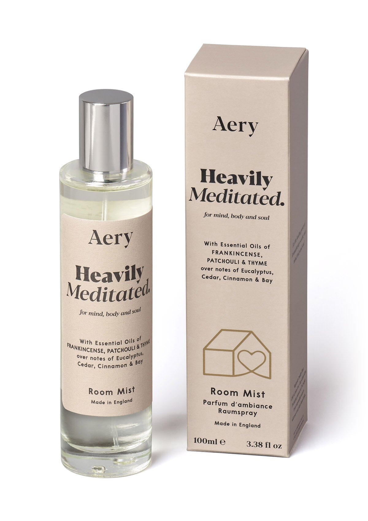 Heavily meditated room mist displayed next to product packaging by Aery on white background 