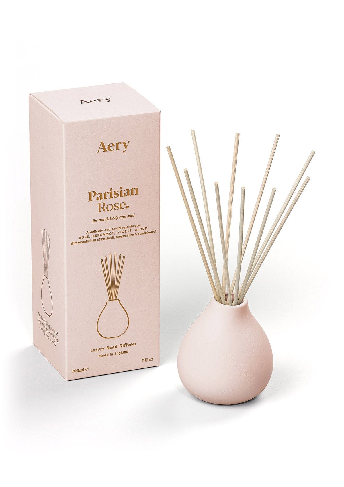 Pale pink Parisian Rose diffuser displayed next to product packaging by Aery on white background 