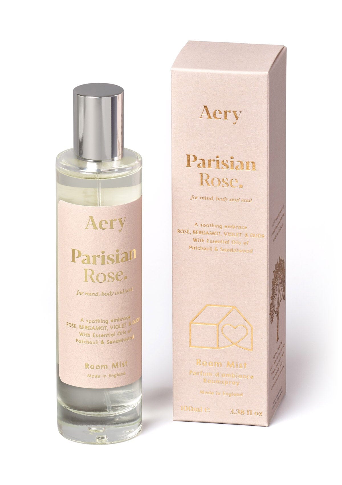 Pale pink Parisian Rose room mist displayed next to product packaging by Aery on white background 