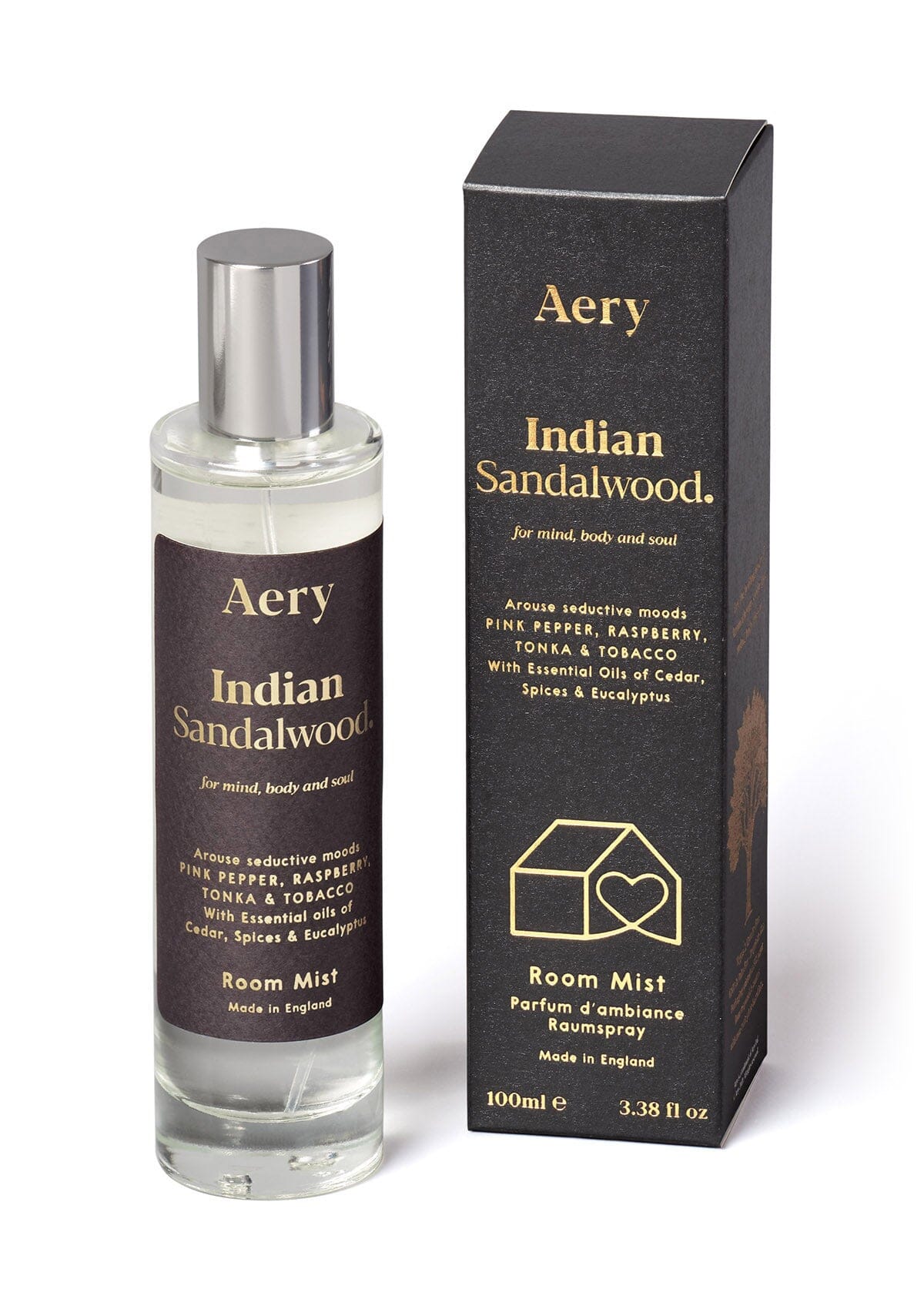 Black Indian Sandalwood room mist displayed next to product packaging by Aery on white background 