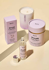 aery living dream catcher pillow spray and dream catcher lavender scented candle, both next to product packaging